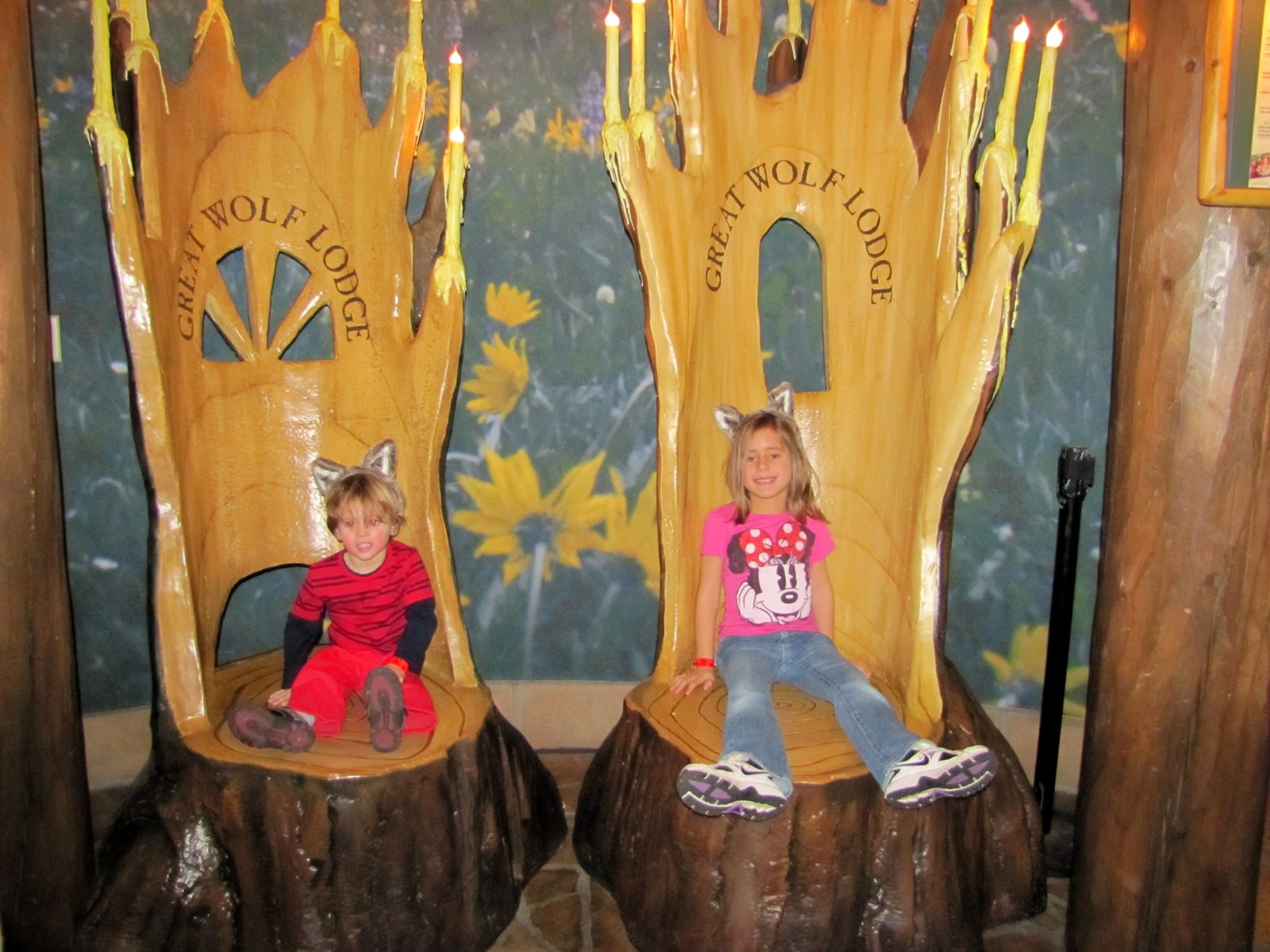 Lisa and Thomas on the carved tree stump chairs