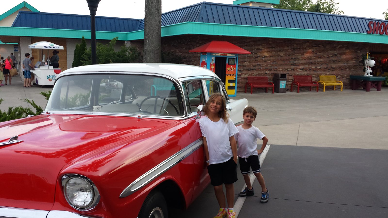 Lisa and Thomas by the antique car