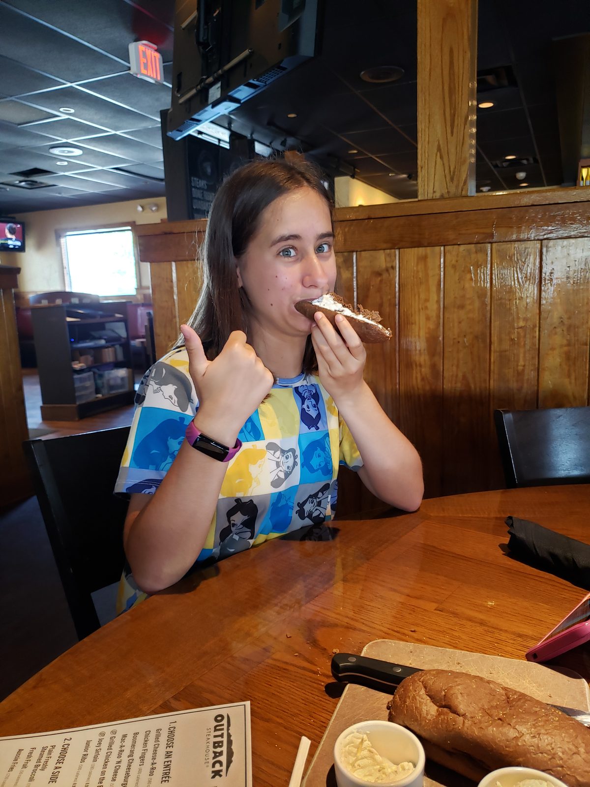 Lisa stops for a bite on the road