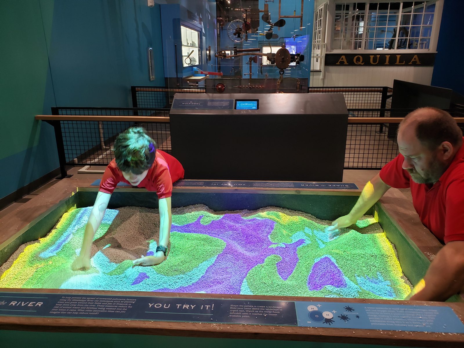 Thomas and I build river terrain at the sand table