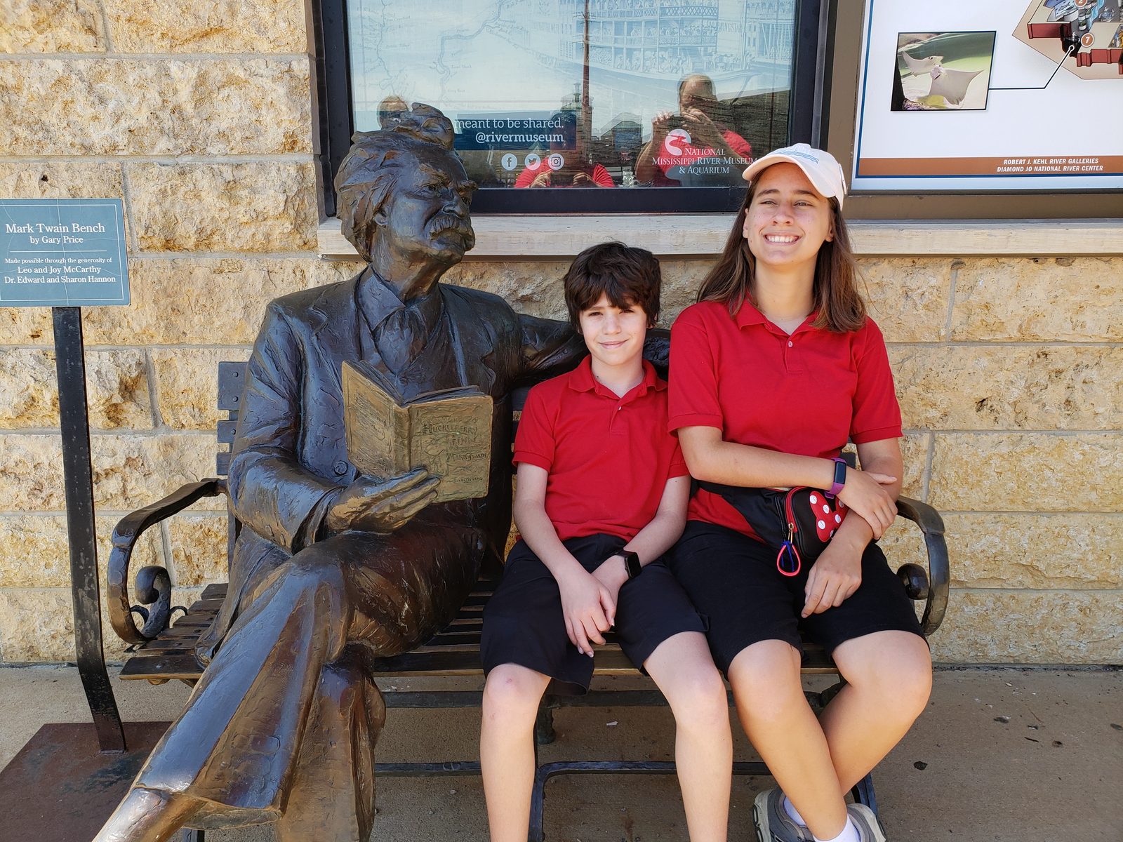 Thomas and Lisa on the Mark Twain bench at the river museum