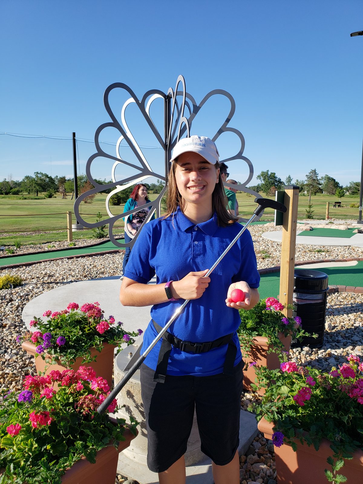 Lisa lines up a putt