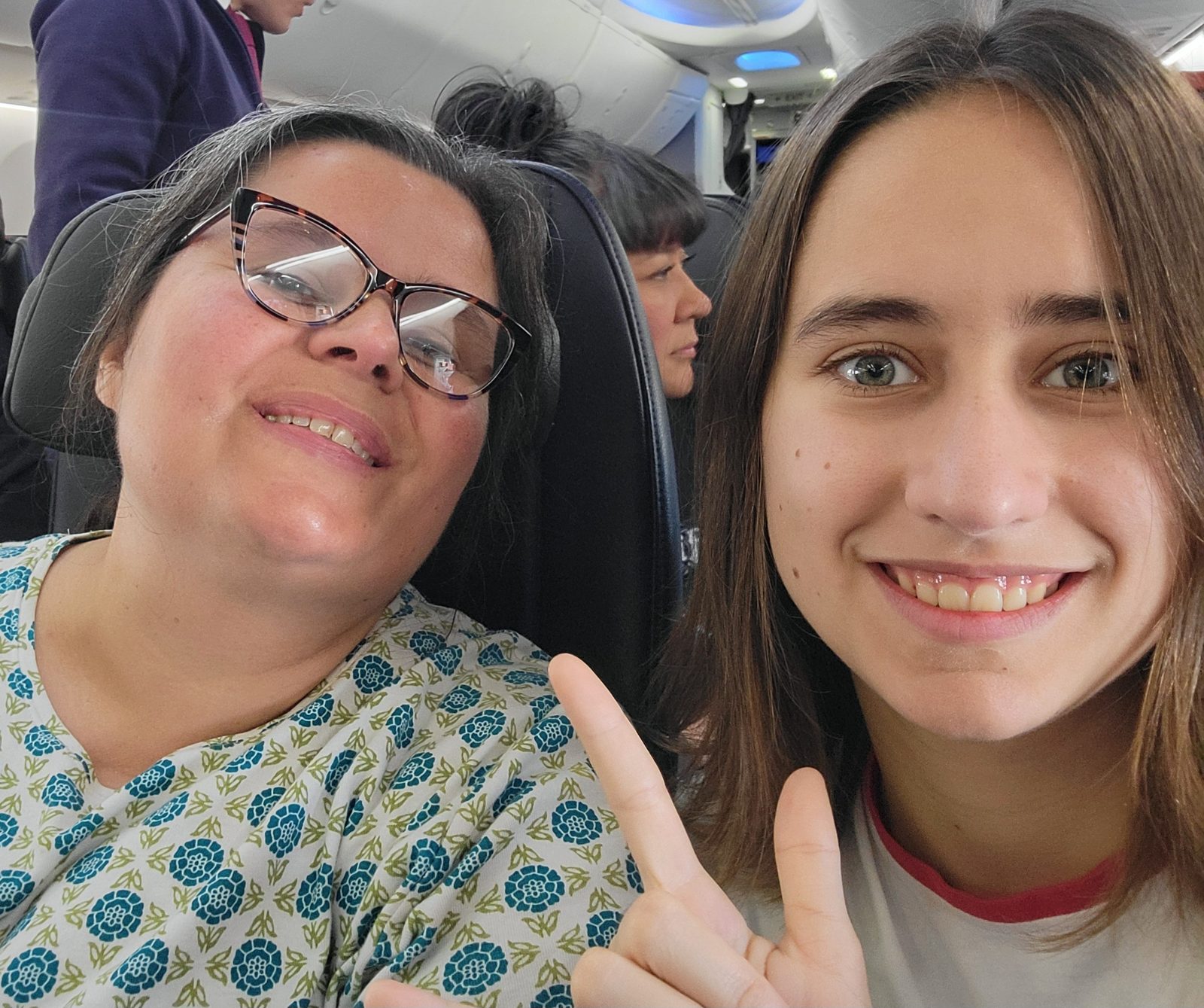 Kathy and Lisa all smiles on the flight to LA