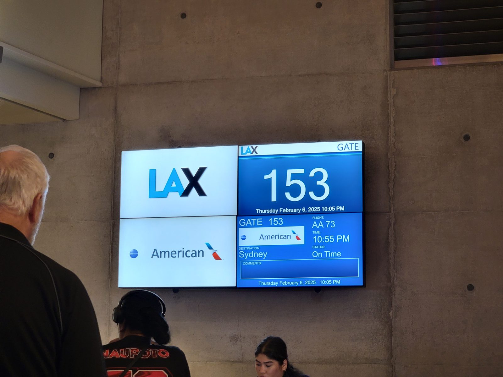 Flight AA73 to Sydney, gate 153