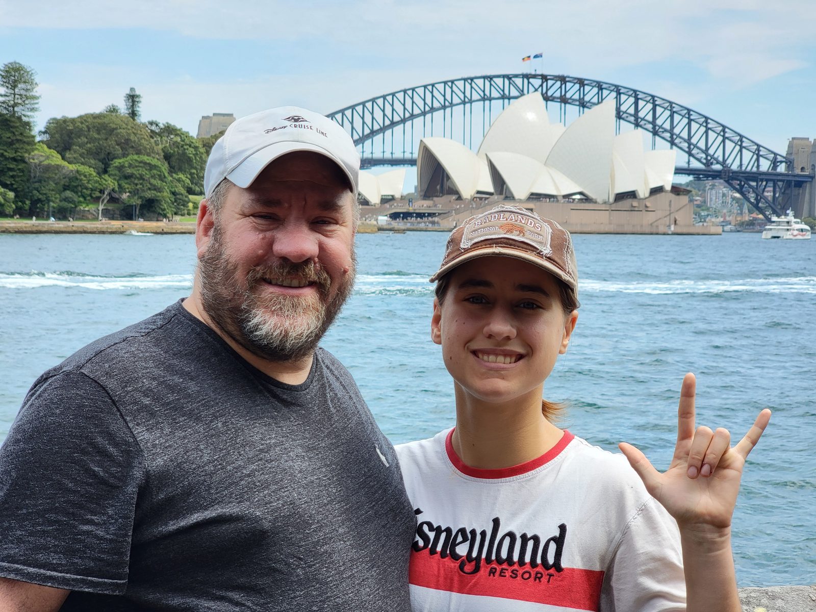 Lisa signing I love you beside Michael at Sydney Harbour