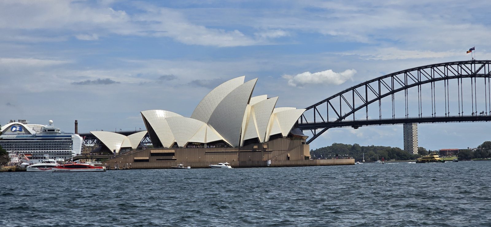 A big cruise ship beside the Opera House