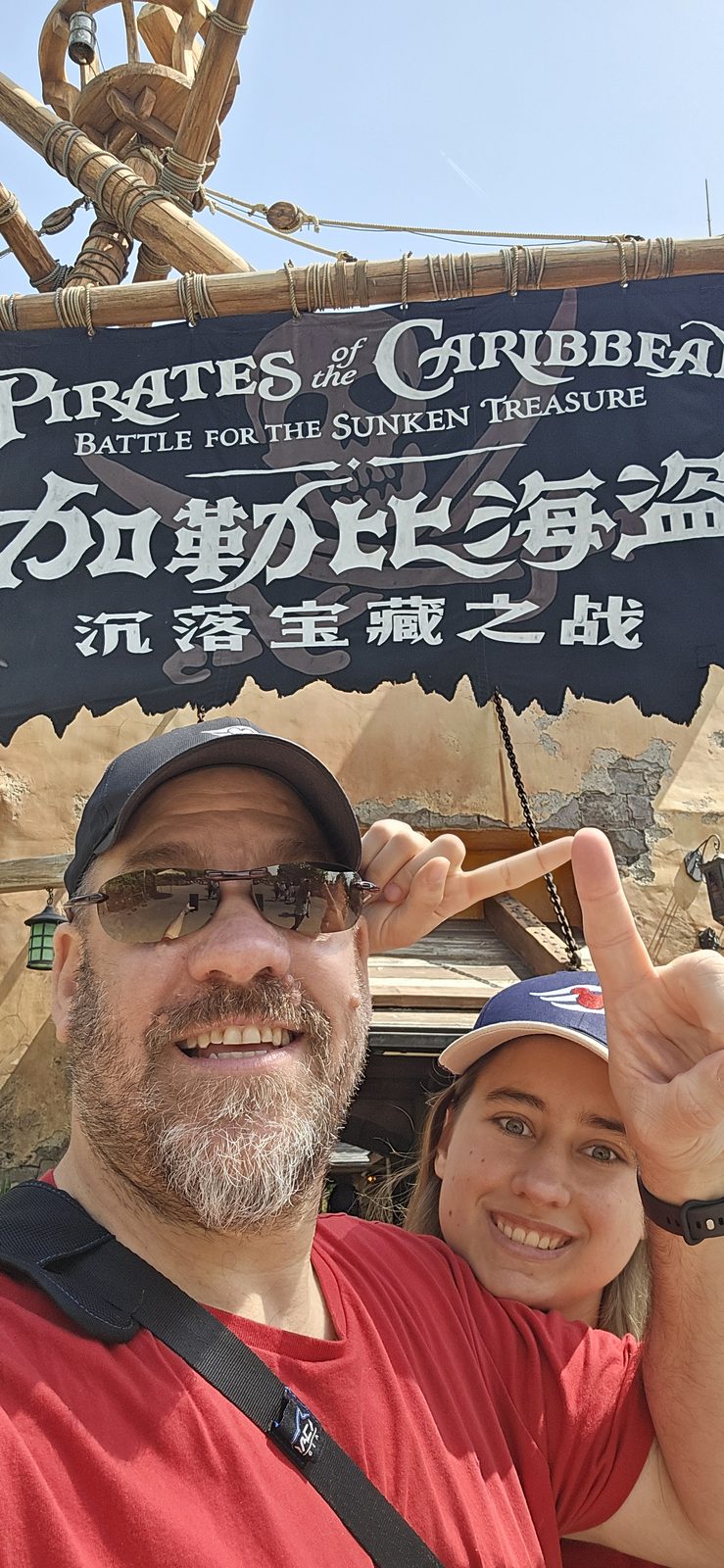 Lisa and me by the Pirates of the Caribbean sign