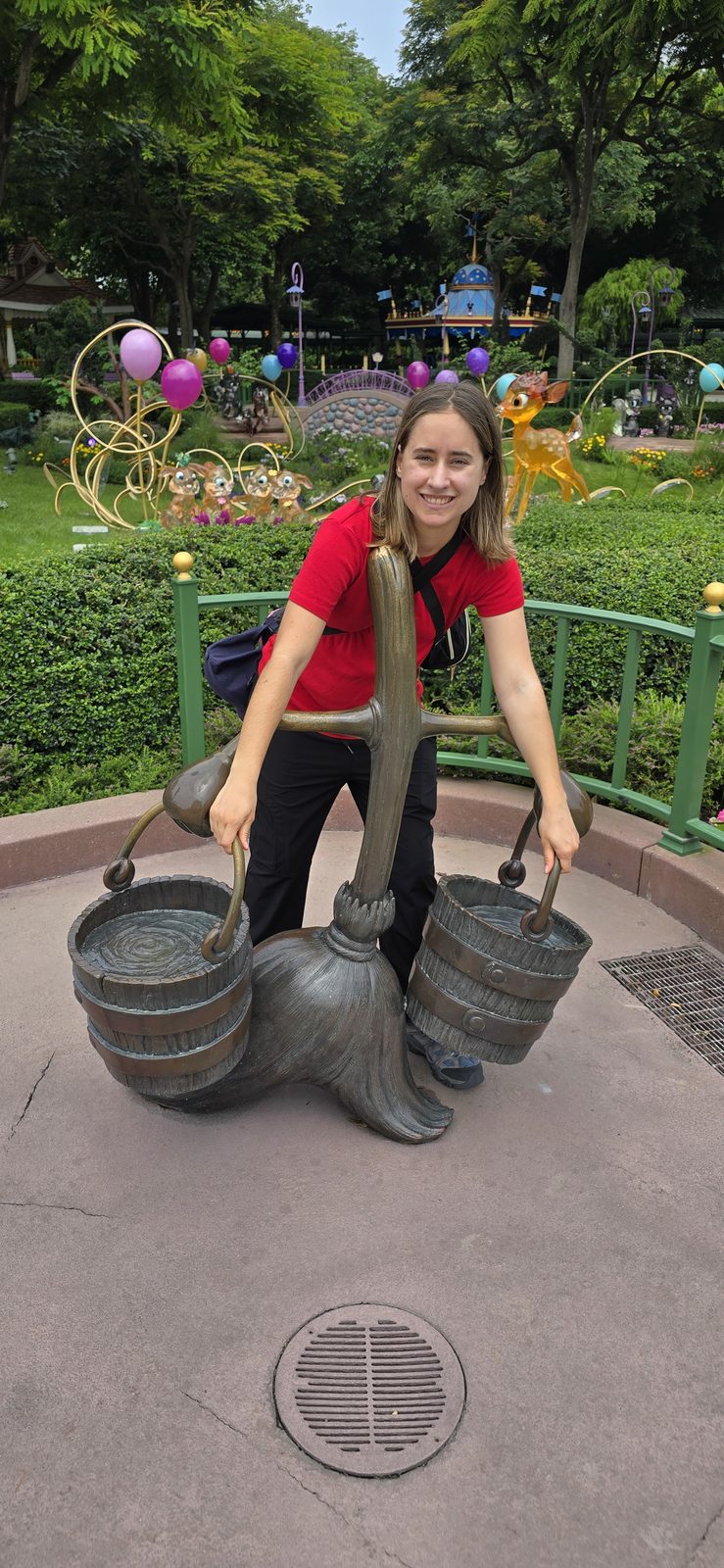 Lisa with the Sorcerer Mickey buckets at Hong Kong Disneyland