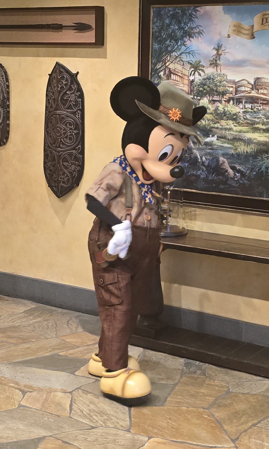 Mickey in his explorer outfit at the Disney Explorers Lodge