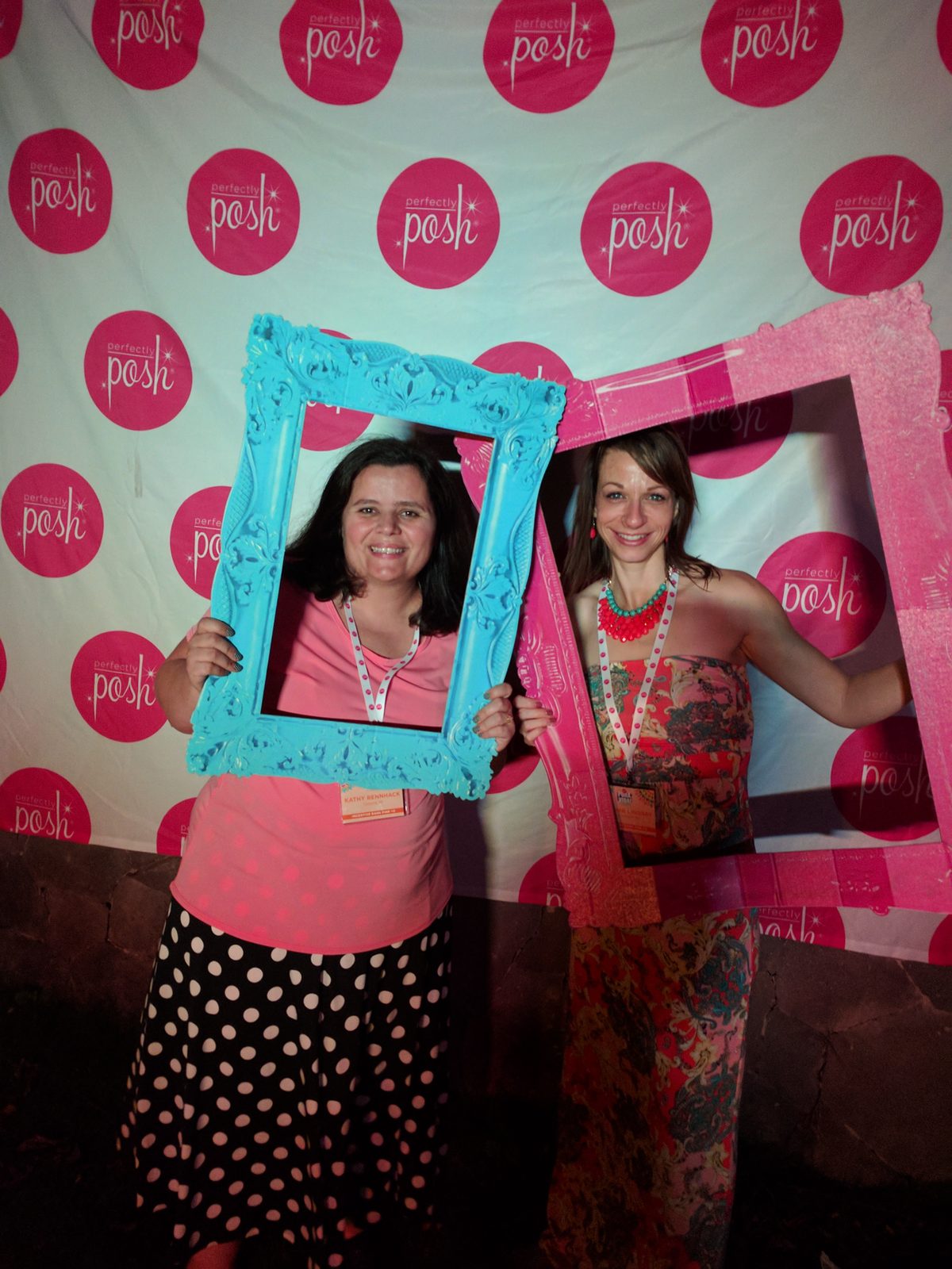 Kathy poses in the photo frame at the Posh party