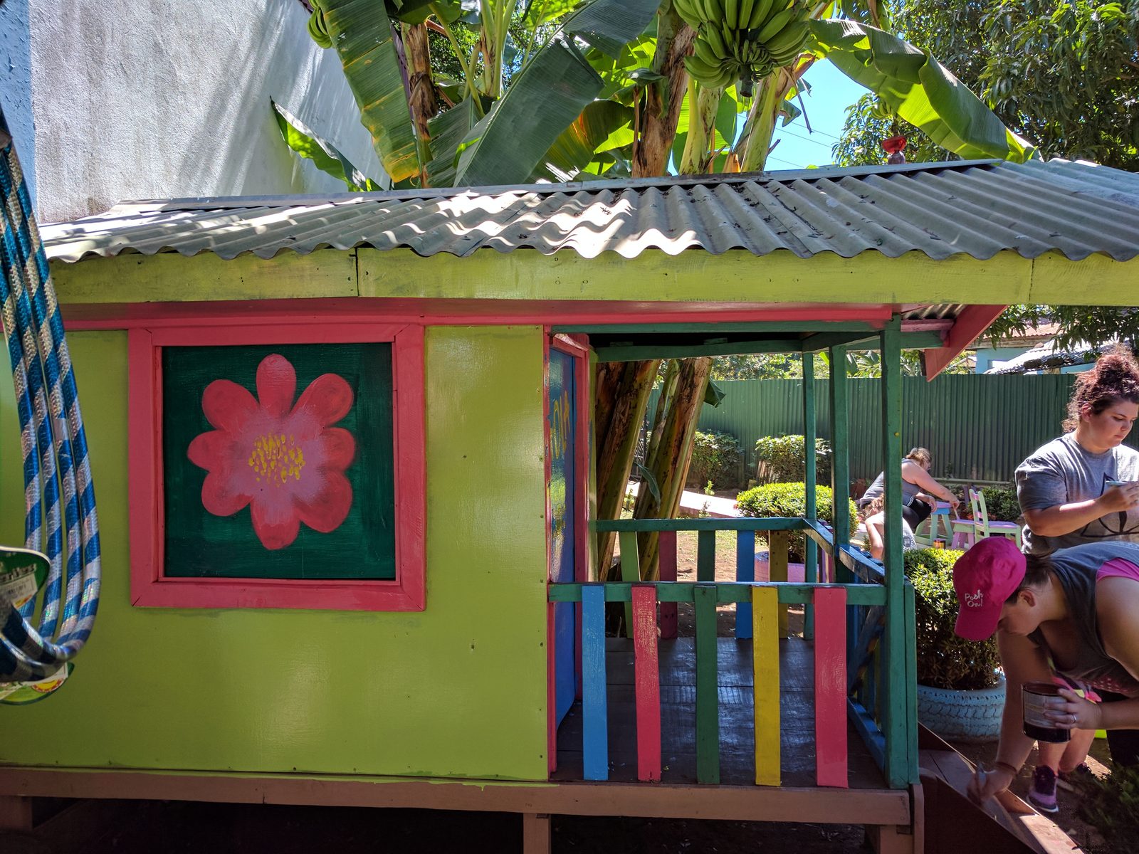 Painting a mural on the playhouse