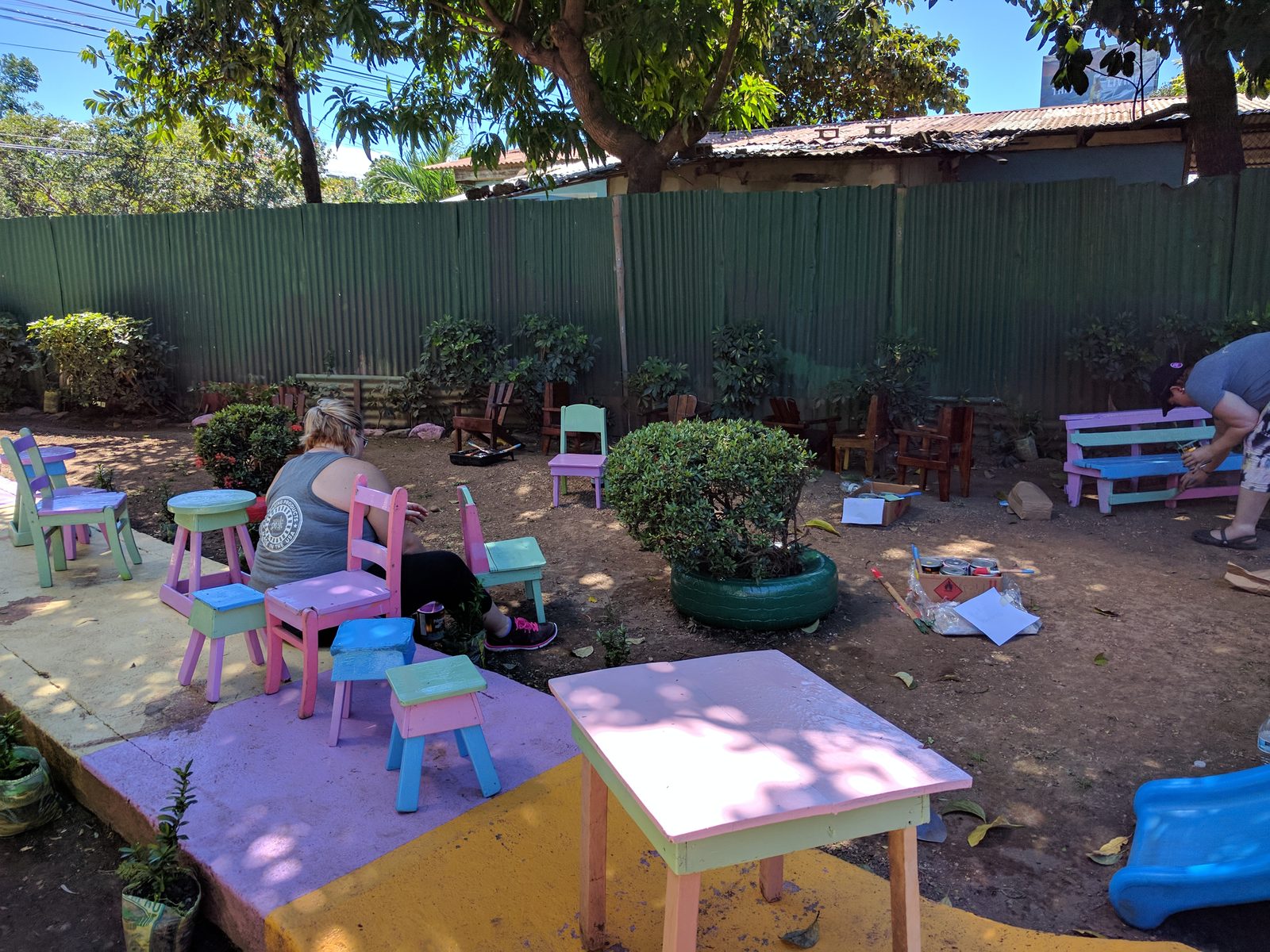 The group painting furniture for the center