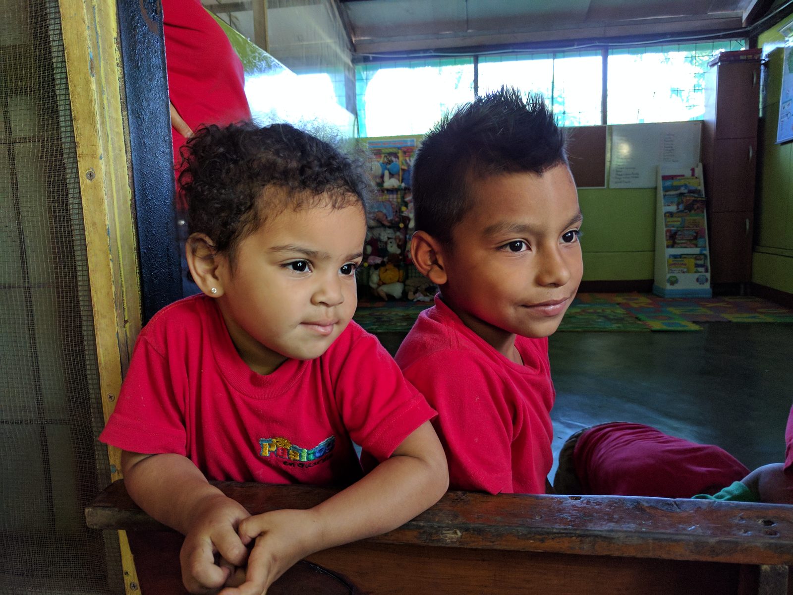 Two of the children at their desks