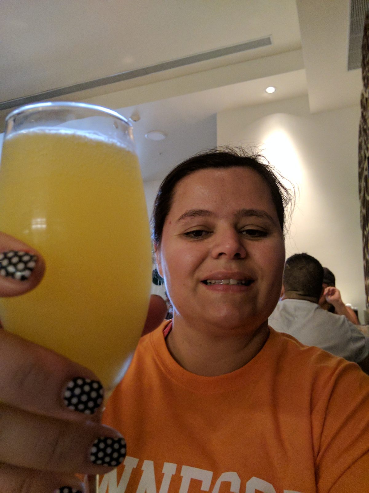 Kathy with a mimosa at breakfast