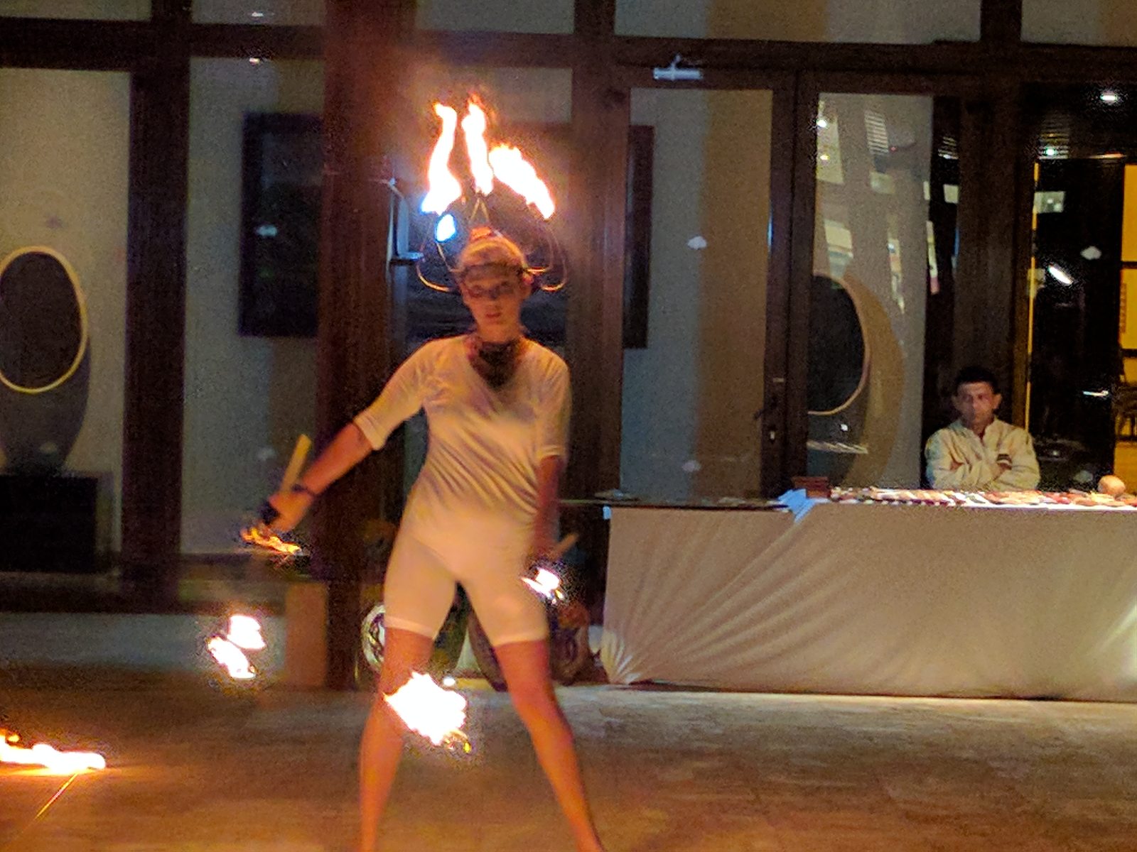 A fire dancer performing at dinner
