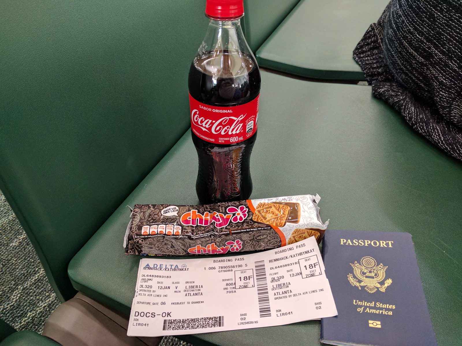 Snack, boarding pass and passport at the gate