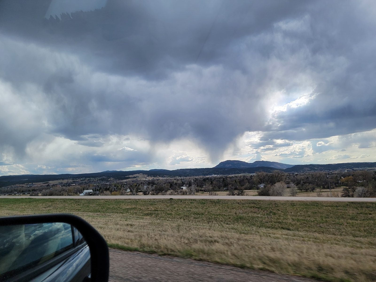Storm clouds moving over the hills