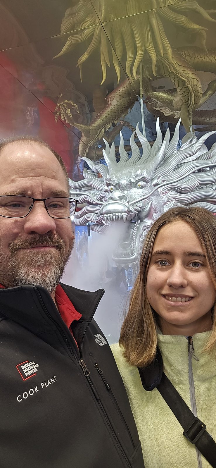 Lisa and me by a dragon display in the Muslim Quarter