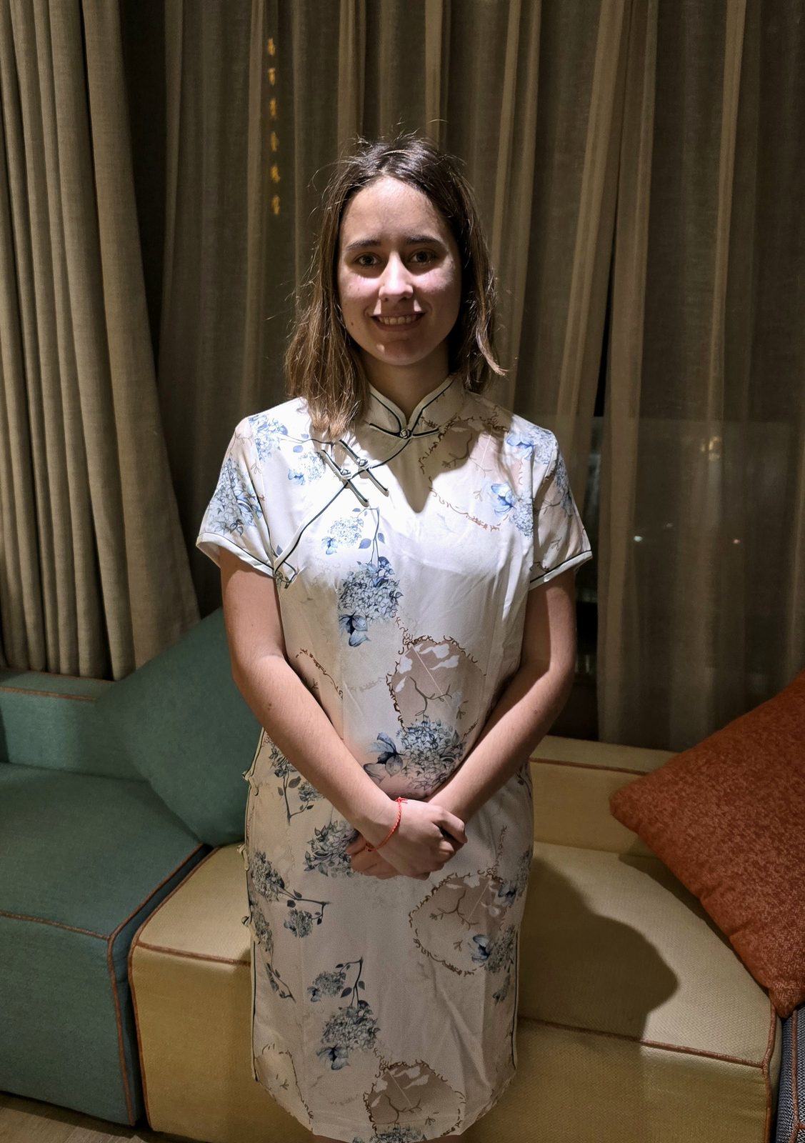 Lisa in a qipao at the hotel
