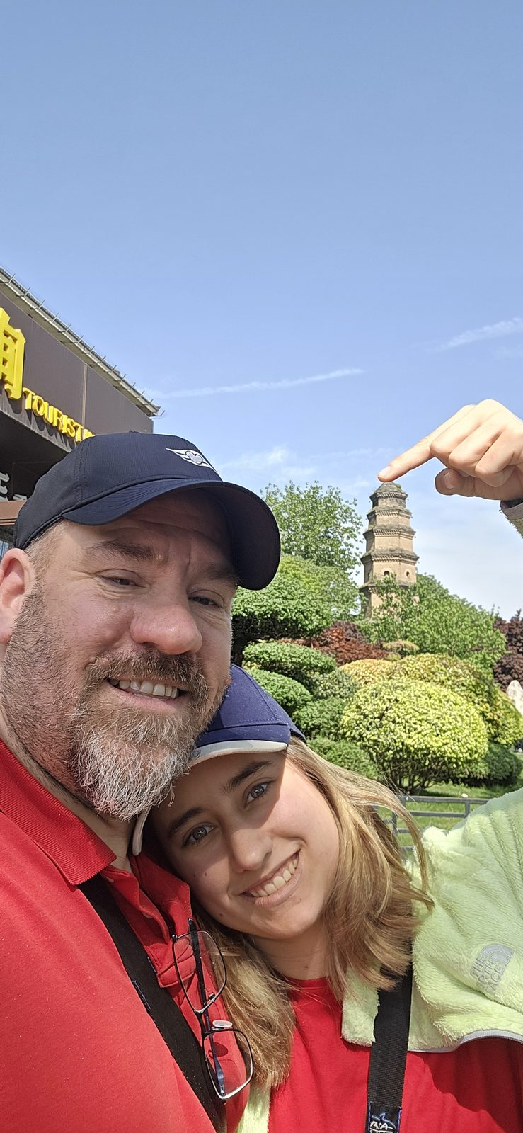 Lisa and me on the Xi'an city wall, pagoda behind us