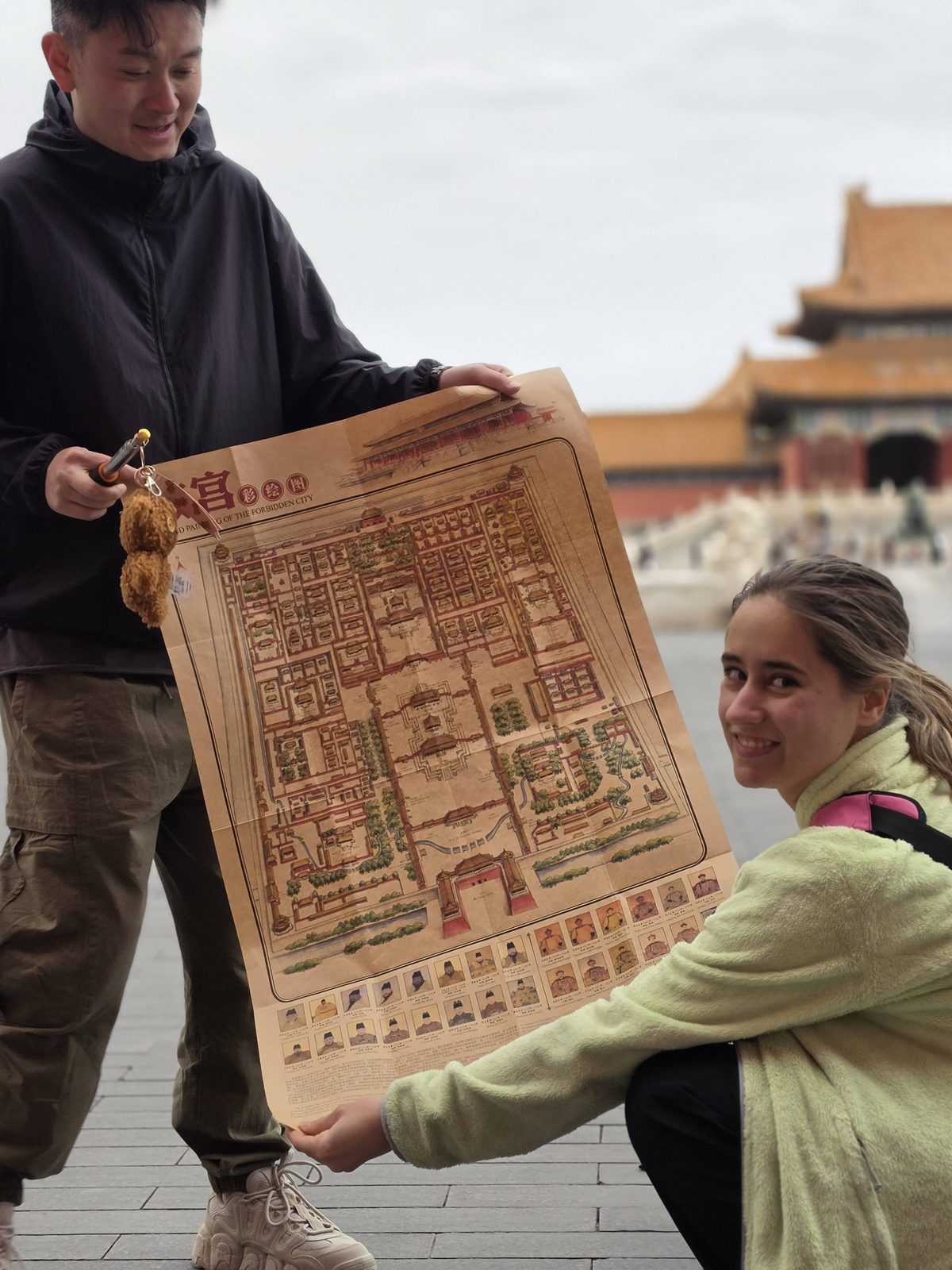 Lisa and the tour guide with a Forbidden City map