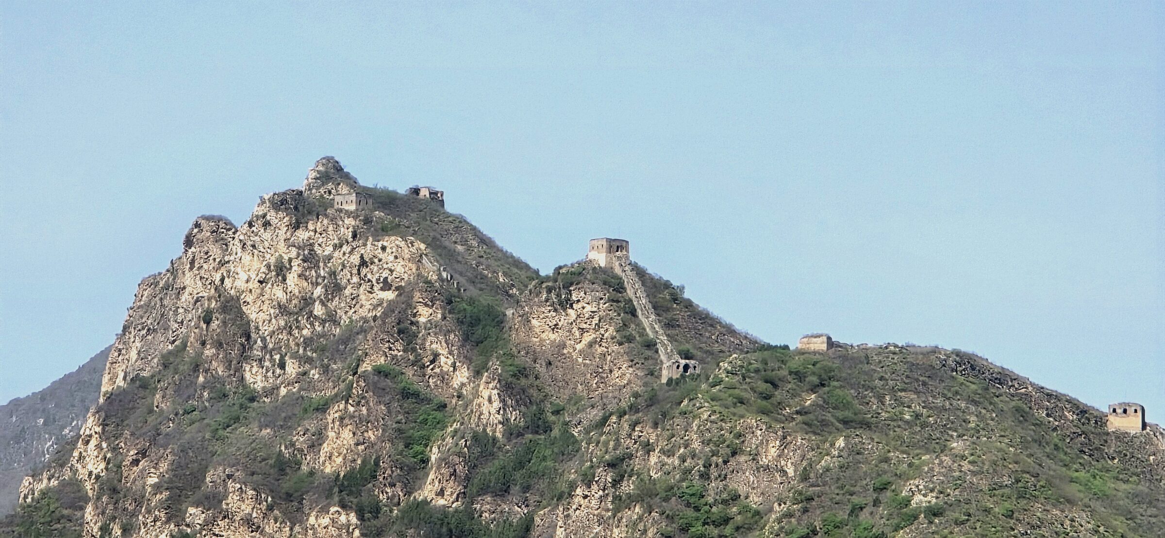 The Great Wall climbing a crag above Gubeikou