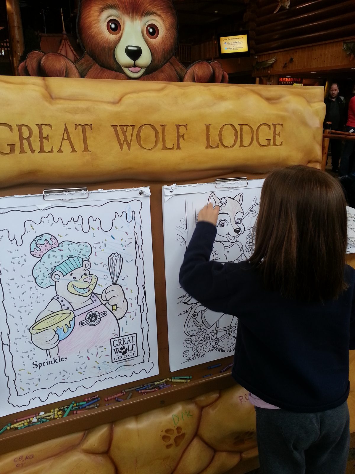 Lisa coloring at the lobby activity easel
