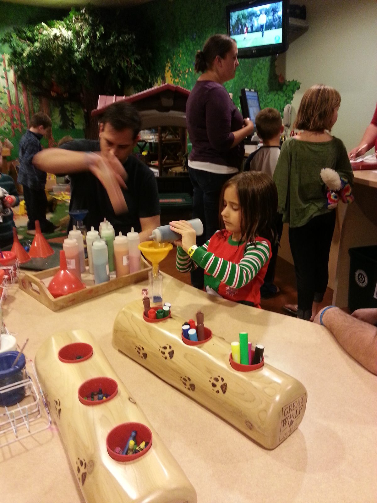 Lisa pouring colors at the Bear Paw counter