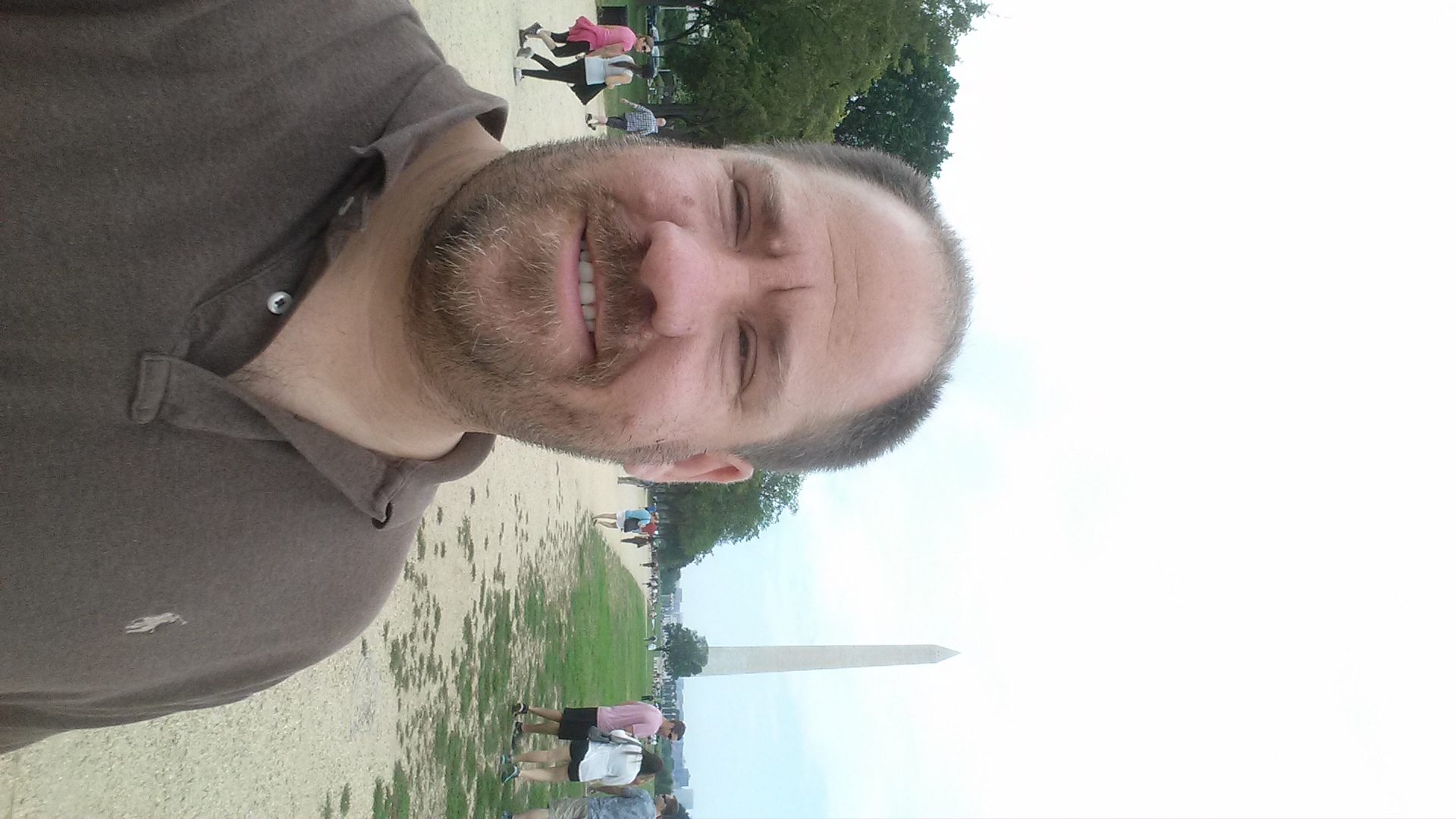 Michael on the National Mall, the Washington Monument behind him