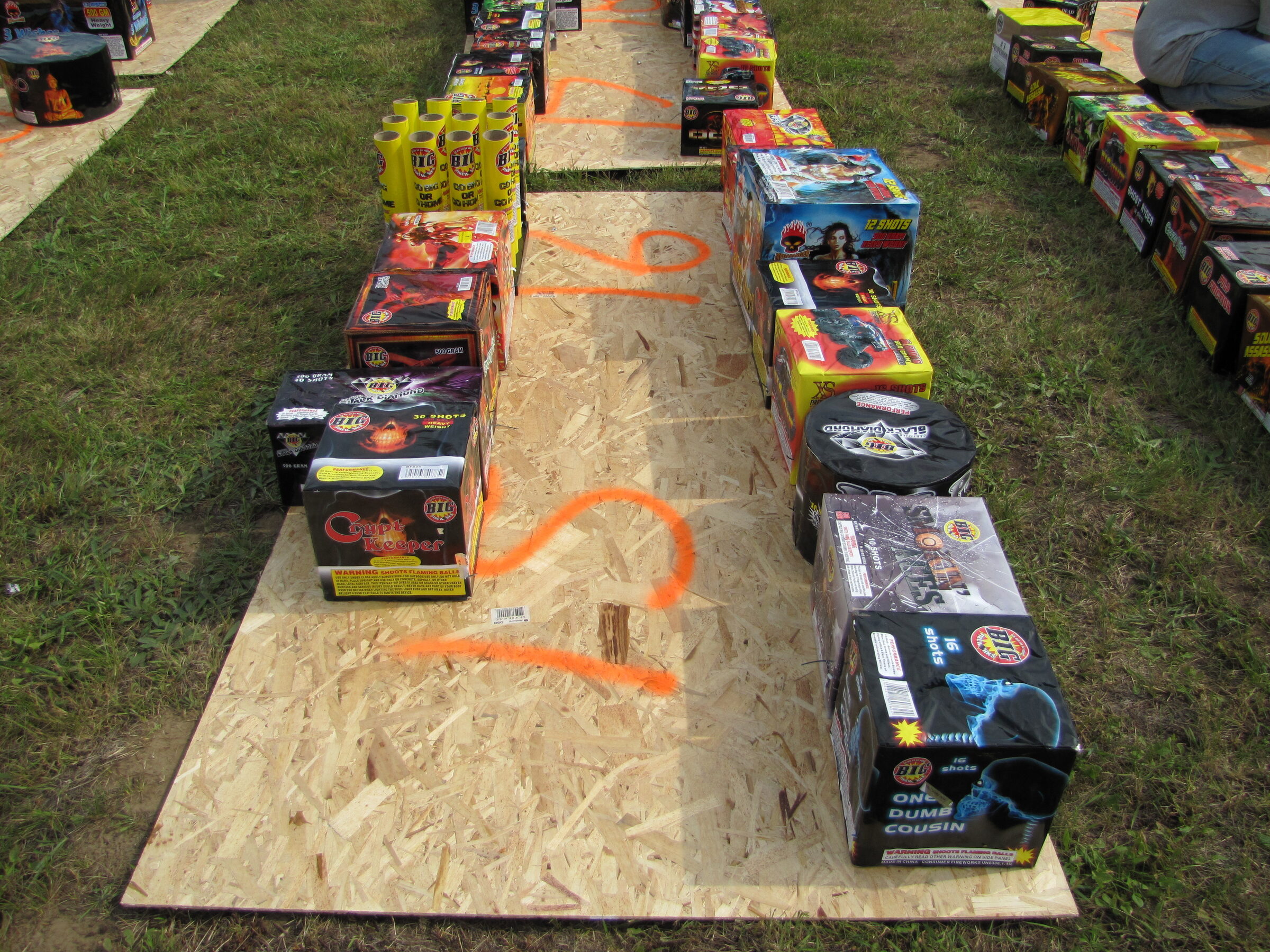 Each board numbered in orange paint